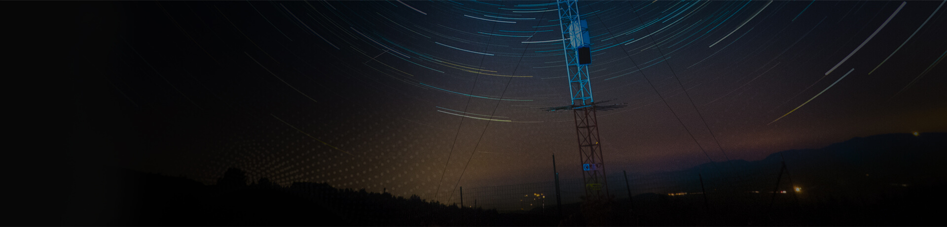 telecommunications solutions from barcodes, inc. radio tower at night